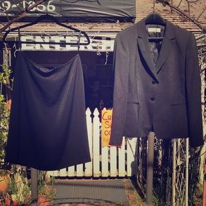 Peak Lapel two button jacket w/matching skirt.
